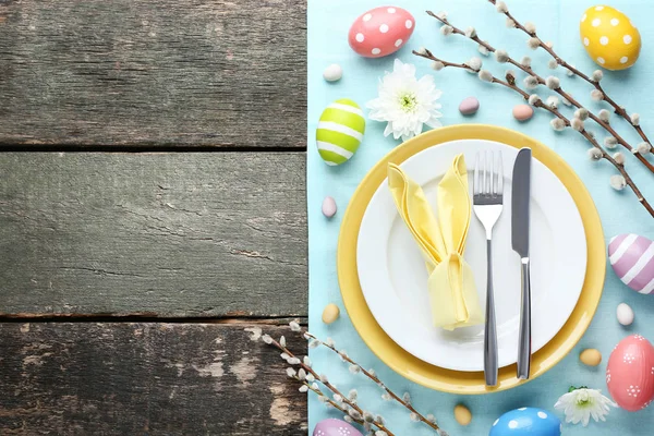 Cutlery with easter eggs and tree branches — Stock Photo, Image