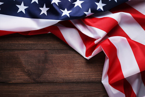 American flag on brown wooden table