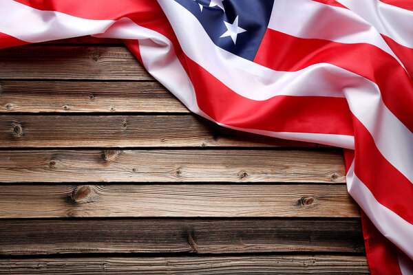 American flag on brown wooden table