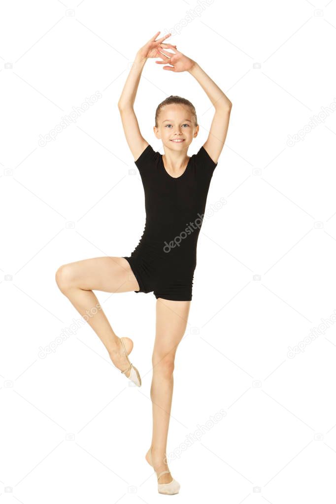 Young girl gymnast isolated on white background 