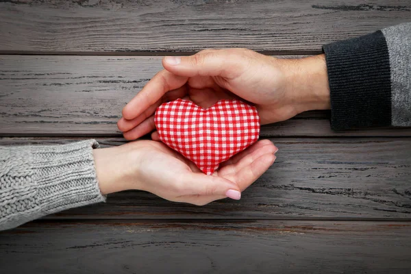 Female Male Hand Holding Red Fabric Heart Grey Background — Stock Photo, Image
