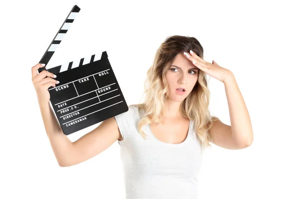 Young woman with blank clapper board on white background — Stock Photo, Image