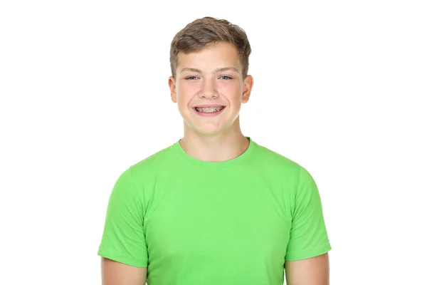 Portrait of young man with dental braces on white background — Stock Photo, Image