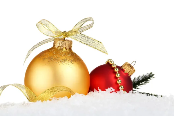 Christmas baubles with fir tree branches on white background Royalty Free Stock Photos