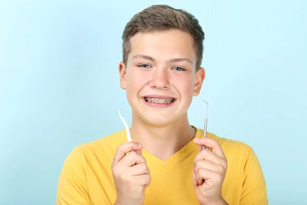 Young Man with Toothbrush Dentist Tool