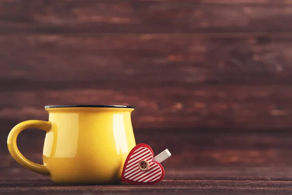 Yellow Cup Clothespin Red Heart Brown Wooden Table — Stock Photo, Image