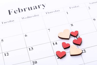 Valentine day calendar with wooden hearts clipart