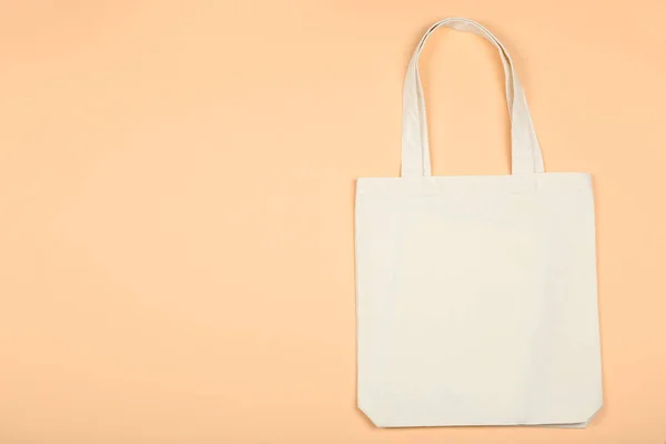 White cotton eco bag on beige background — Stock Photo, Image