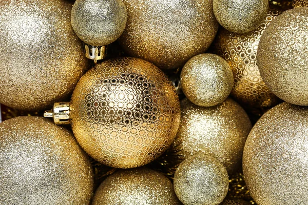 Fundo de bugigangas de Natal de ouro — Fotografia de Stock