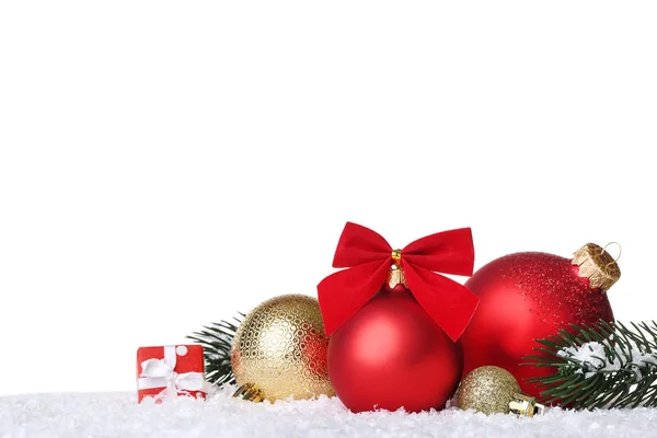 Christmas balls with fir tree branches and gift box on white bac — Stock Photo, Image