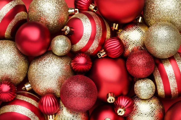 Background of red and golden christmas baubles Royalty Free Stock Photos