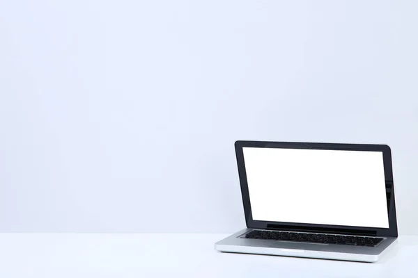 Laptop computer on grey background — Stock Photo, Image