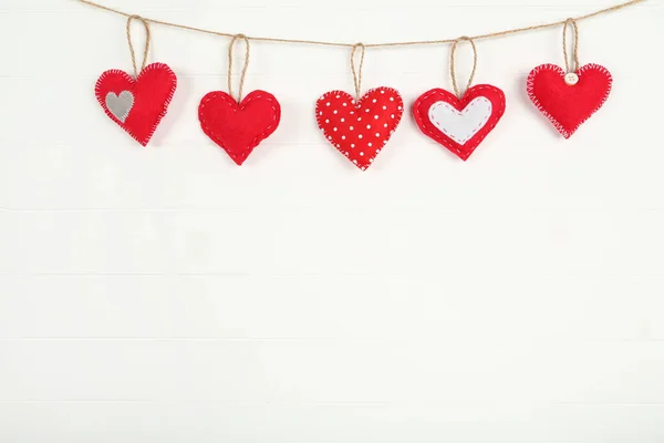 Fabric Hearts Hanging White Wooden Background — Stock Photo, Image
