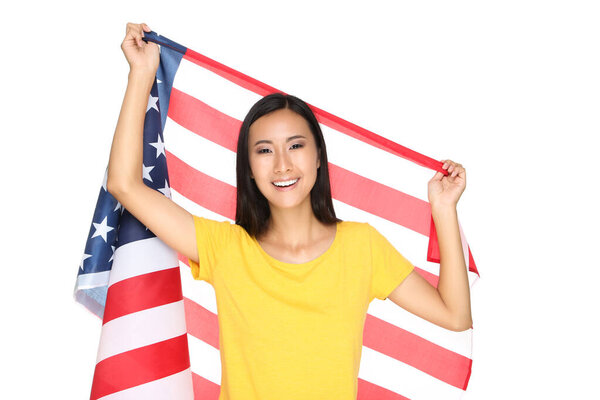 Young woman holding American flag isolated on white background