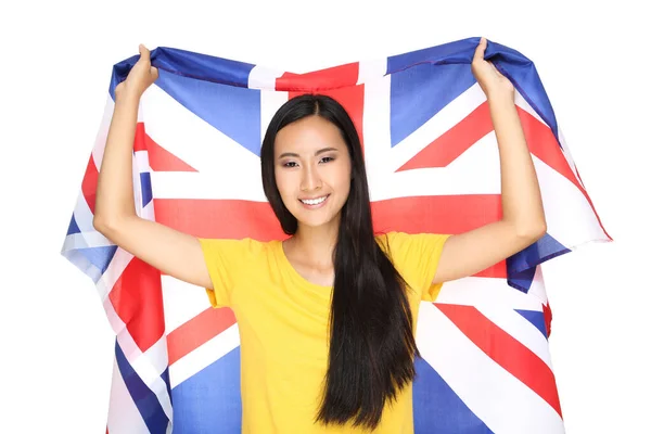 Young woman holding British flag isolated on white background — Stock Photo, Image