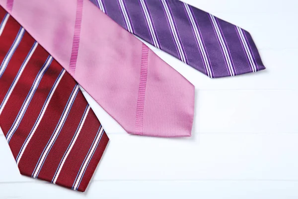 Colored Neckties White Wooden Table — Stock Photo, Image