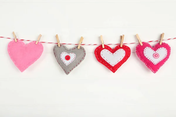 Colorful Fabric Hearts Clothespins Hanging White Wooden Background — Stock Photo, Image