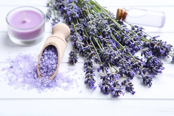 Lavender Flowers Oil Bottle Candle Salt White Wooden Table — Stock Photo, Image