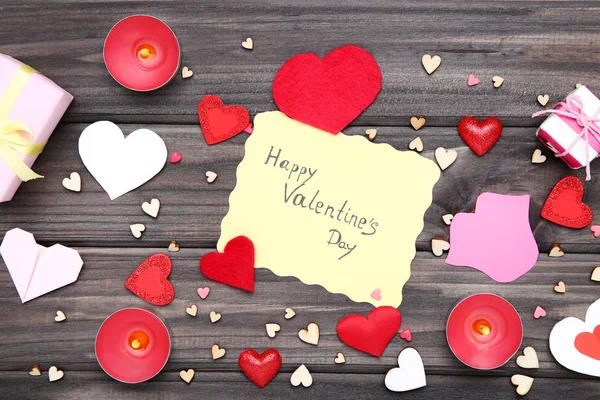 Valentine hearts with candles and text Happy Valentines Day on w — Stock Photo, Image