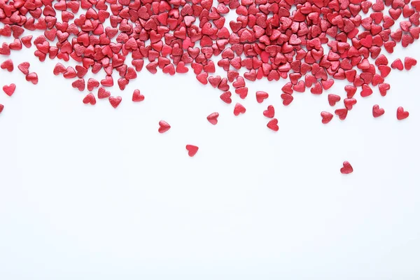 En forma de corazón espolvorea sobre fondo blanco — Foto de Stock