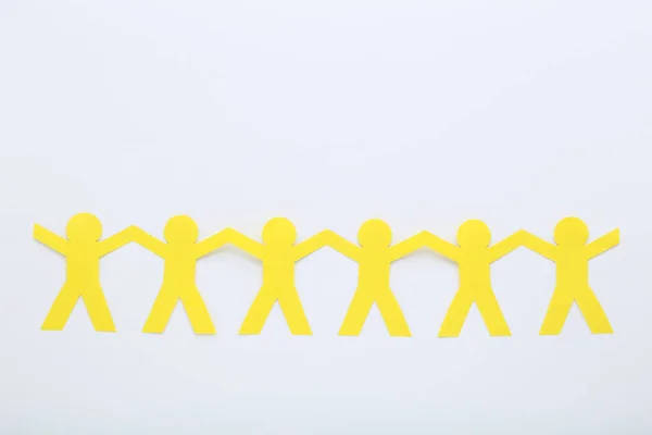 Paper chain people on white background — Stock Photo, Image