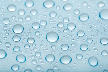 Mavi Arkaplanda Su Damlaları