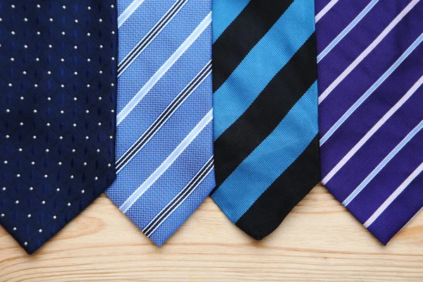 Colorful Neckties Brown Wooden Table — Stock Photo, Image