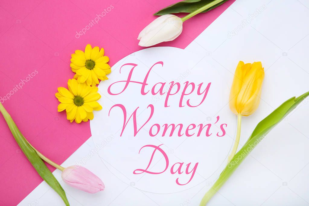 Text Happy Womens Day with tulip and chrysanthemum flowers on paper background