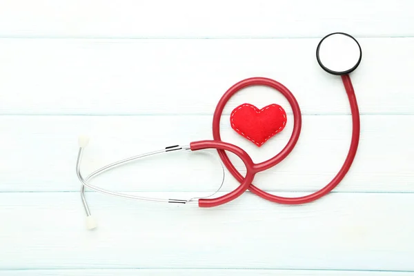 Stethoscope Red Fabric Heart White Wooden Table — Stock Photo, Image