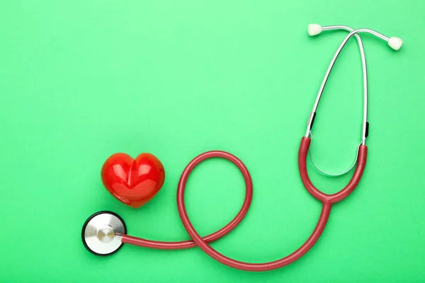 Stethoscope Red Heart Green Background — Stock Photo, Image