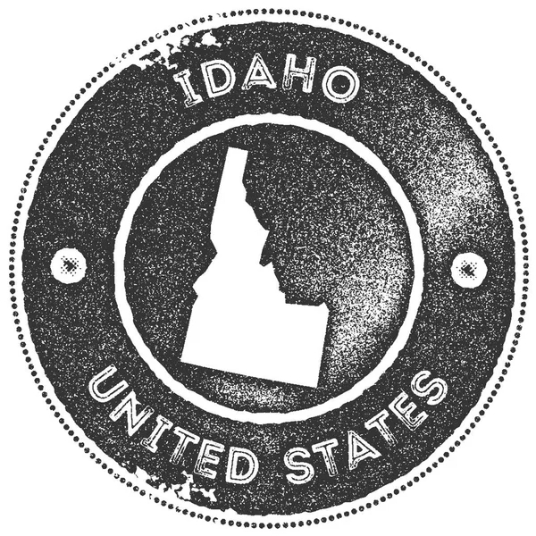 Idaho megjelenítése vintage bélyegző Retro stílusú kézzel címke, jelvény vagy elem az utazási ajándéktárgyak sötét — Stock Vector