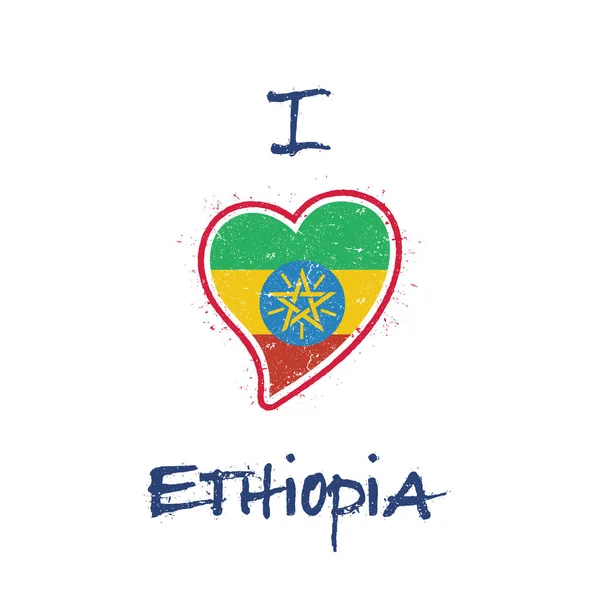 Bandera de Etiopía diseño de camiseta patriótica Bandera nacional en forma de corazón Etiopía sobre fondo blanco — Vector de stock
