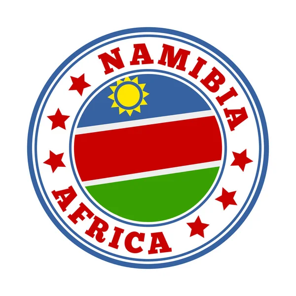 Namibia signo país redondo logotipo con la bandera de Namibia Vector illustration — Vector de stock