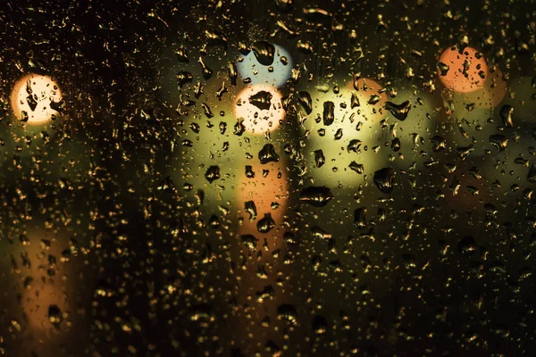 Beautiful Drops Water Glass Street Light Night Blur Background — Stock Photo, Image