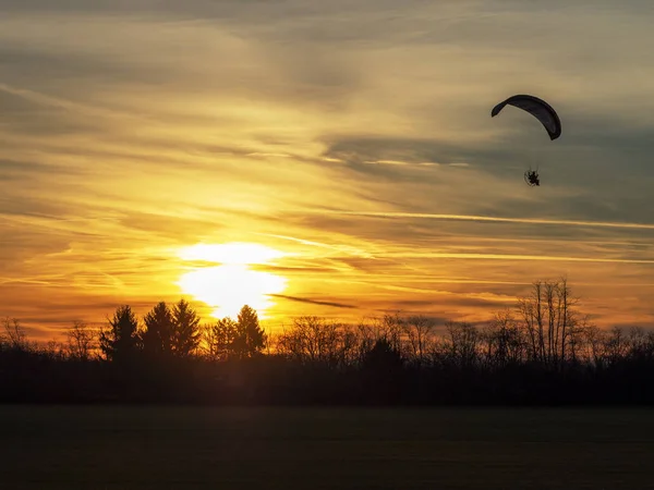 Motorized Parachute in sunset park