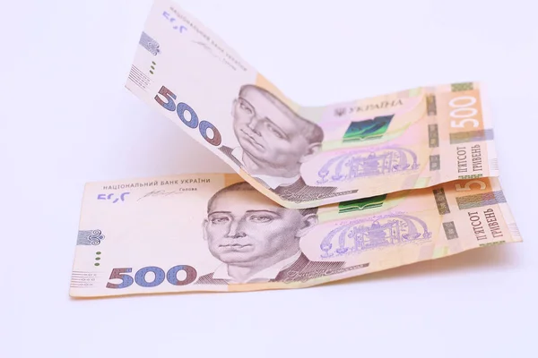 Two new banknotes in denominations of 500 Ukrainian hryvnias isolated on a white background with shadow. European money exchange. Ukraine currency — 图库照片