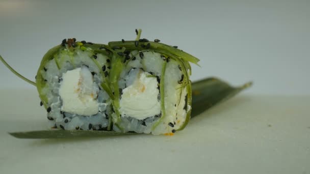 Macro shot of sushi. Japanese restaurant, sushi, oriental tradition. — Stock Video