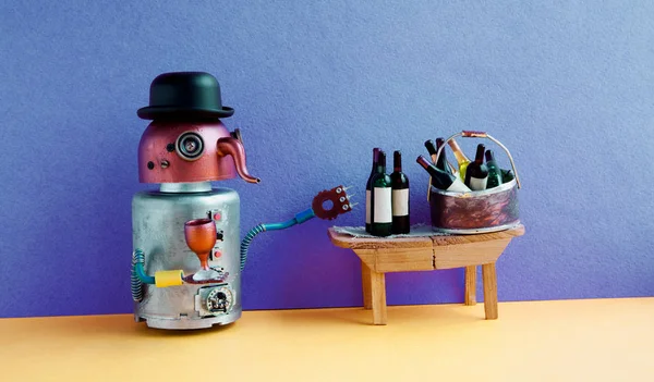 Funny robot alcoholic gets drunk. Wine party event concept. Creative design copper head long nose cyborg with wine glass and bottle. Wooden table, bucket with spirits, blue wall yellow floor interior.