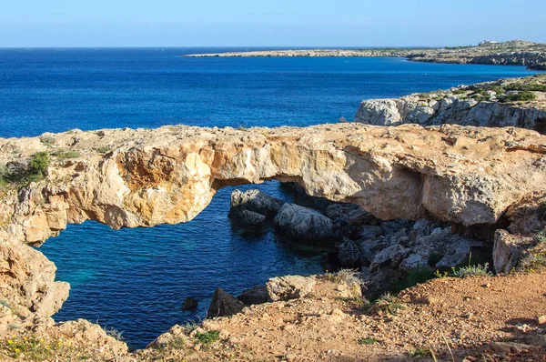 Natural stone bridge cave in Mediterranean Sea, Ayia Napa, Cyprus. Stock Photo