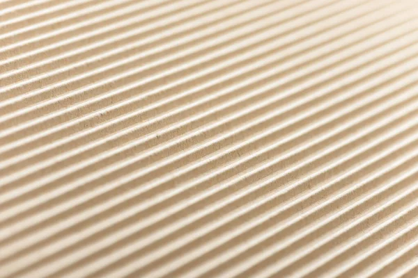 纸板箱或纸板包装材料 用纤维素制成的波纹纸的结构 用于创建盒子和包装的用品 白板背景 天然褐色纸板表面 — 图库照片