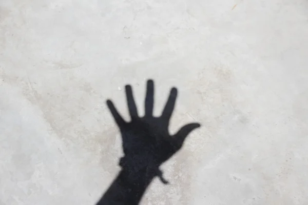 Menselijke hand schaduw — Stockfoto