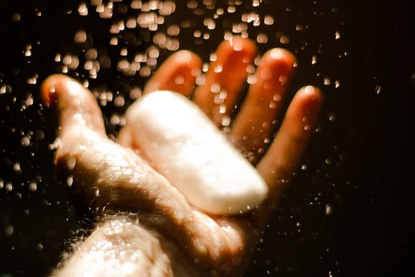 Open human hand with soap — Stock Photo, Image