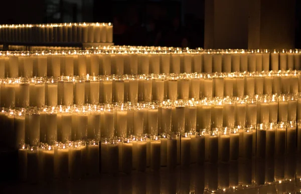 Some lighted wax candles — Stock Photo, Image