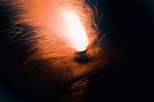 Fire works and sparkles on dark background — Stock Photo, Image