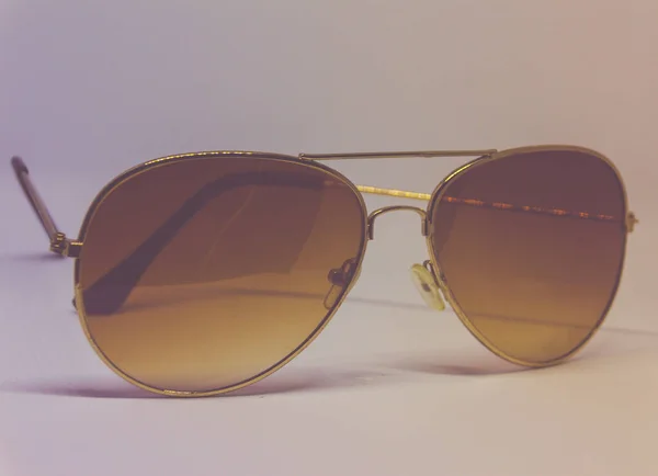 Sluneční brýle v lightboxu photograsph — Stock fotografie