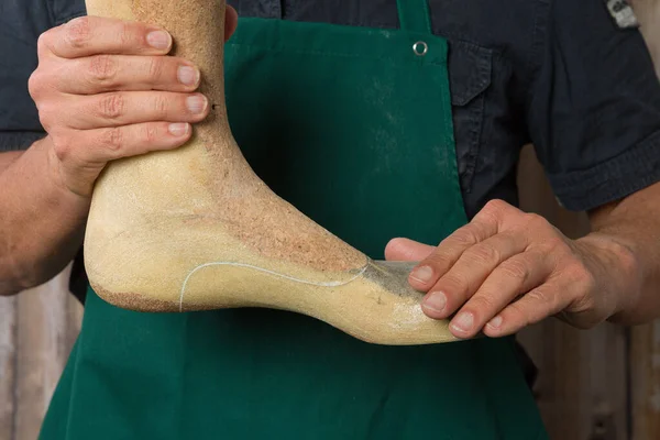 Close Orthopedic Shoemaker Hands Checking Quality Wooden Last — Stock Photo, Image