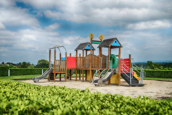 Colorful playground on yard in the park.