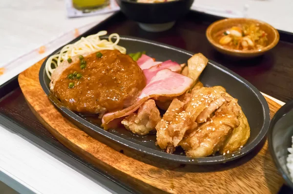 Pork hamburg, bacon and fried chicken ontop with teriyaki sauce — Stock Photo, Image