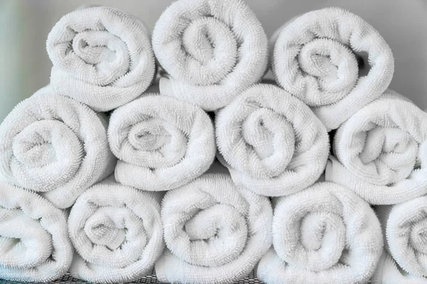 White Rolled Towels on Wooden Countertop Spa Beauty Body Care Hygiene  Procedure at Bathroom. Blurred Background Stock Image - Image of sunny,  laundry: 263770707