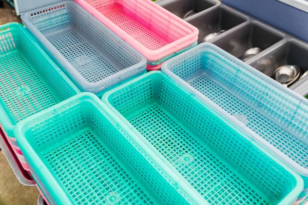 The Colorful plastic baskets.